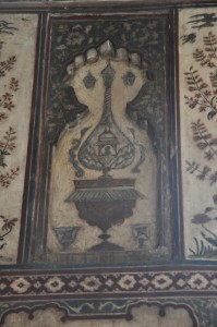 Wall decoration -Human figures inside canopies, and Vase handles with duck heads