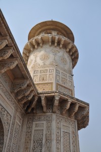 Detail of exterior façade – Octagonal tower with parapet, mosaics with various stones