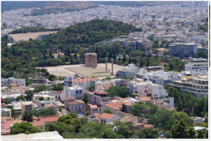 View of Temple of Zeus and the modern city, Athens, Greece.