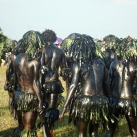 Tribals partcipating in the dance form as evil, painted in black