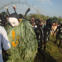 Bohua dancer clad in banana leaves and mask